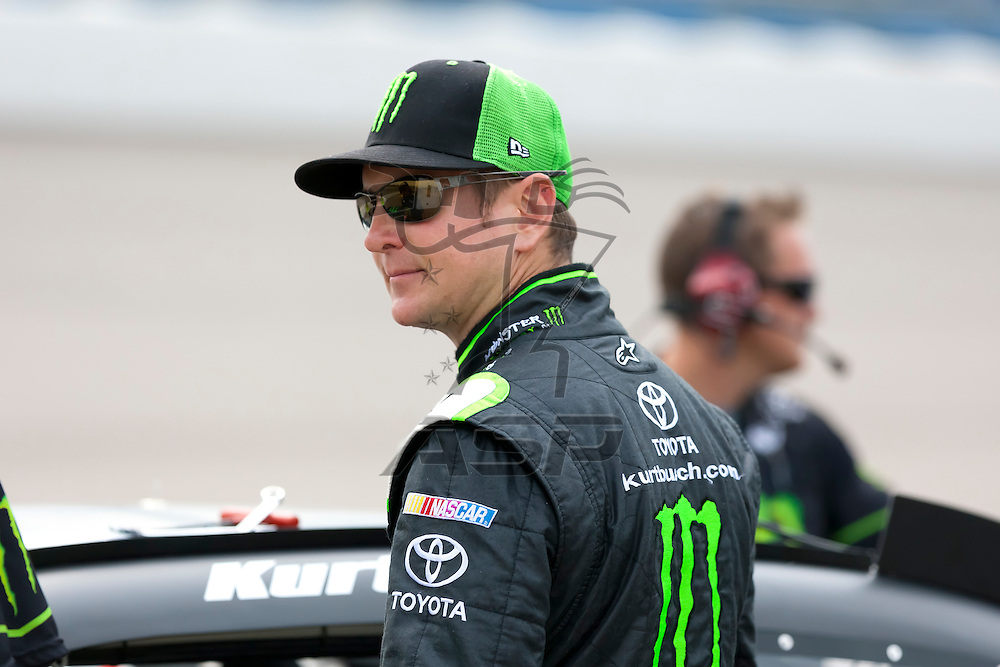 NEWTON, IA - AUG 04, 2012: Kyle Busch (54) and crew prepare to qualify for the U.S. Cellular 250 at the Iowa Speedway in Newton, IA.
