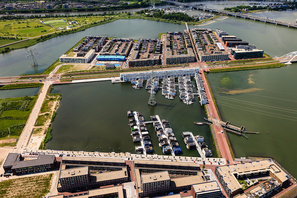 Nederland, Noord-Holland, Amsterdam, 14-06-2012; IJburg, Steigereiland, IJburglaan (midden), drijvende huizen. Zeeburgerbrug in de achtergrond..New constructed urban development, residential district IJburg , floating houses..luchtfoto (toeslag), aerial photo (additional fee required).foto/photo Siebe Swart