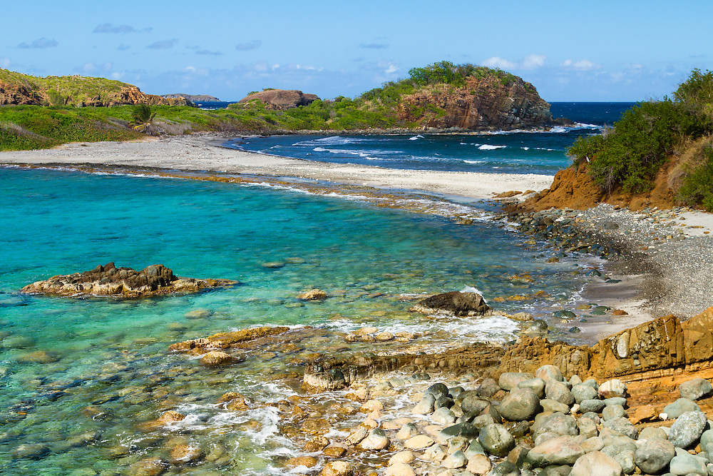 A ribbon of an isthmus "separates the Caribbean Sea from the Atlantic Ocean" on the far west end of St. Thomas, US Virgin Islands. This is Mermaid's Chair sitting upon Botany Bay.