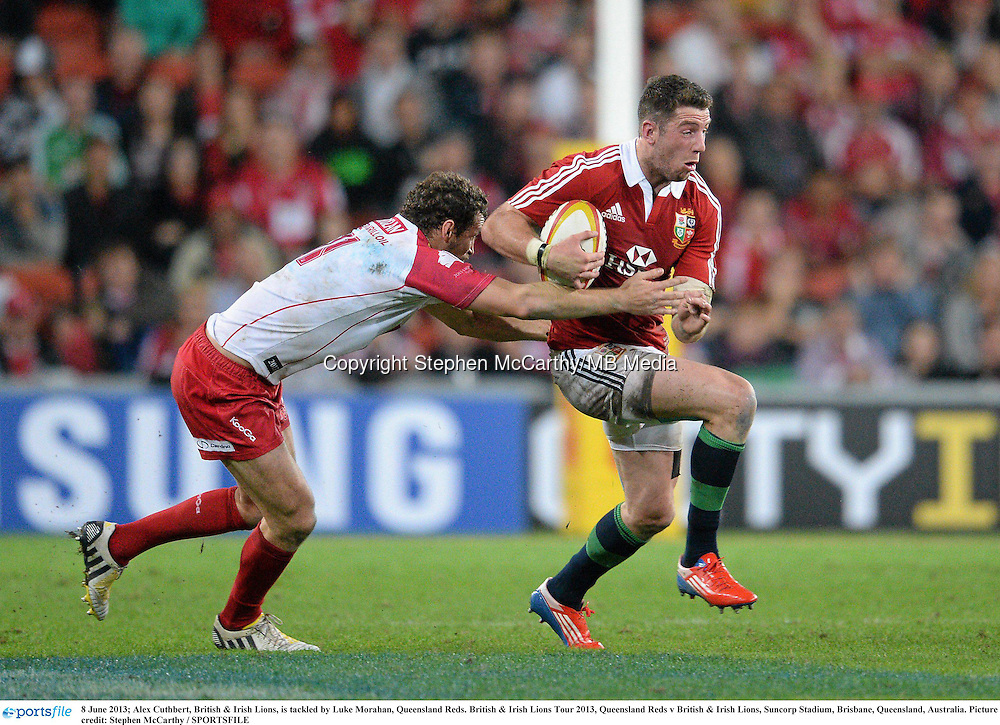 8 June 2013; Alex Cuthbert, British & Irish Lions, is tackled by Luke Morahan, Queensland Reds. British & Irish Lions Tour 2013, Queensland Reds v British & Irish Lions, Suncorp Stadium, Brisbane, Queensland, Australia. Picture credit: Stephen McCarthy / SPORTSFILE