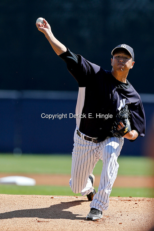 Mar 16, 2013; Tampa, FL, USA; New York Yankees starting pitcher Hiroki Kuroda (18) against the Philadelphia Phillies during a spring training game at George Steinbrenner Field. Mandatory Credit: Derick E. Hingle-USA TODAY Sports
